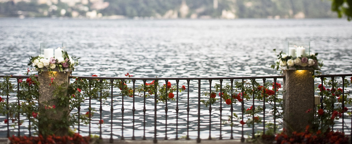 destination wedding red flowers amazing lake view 2